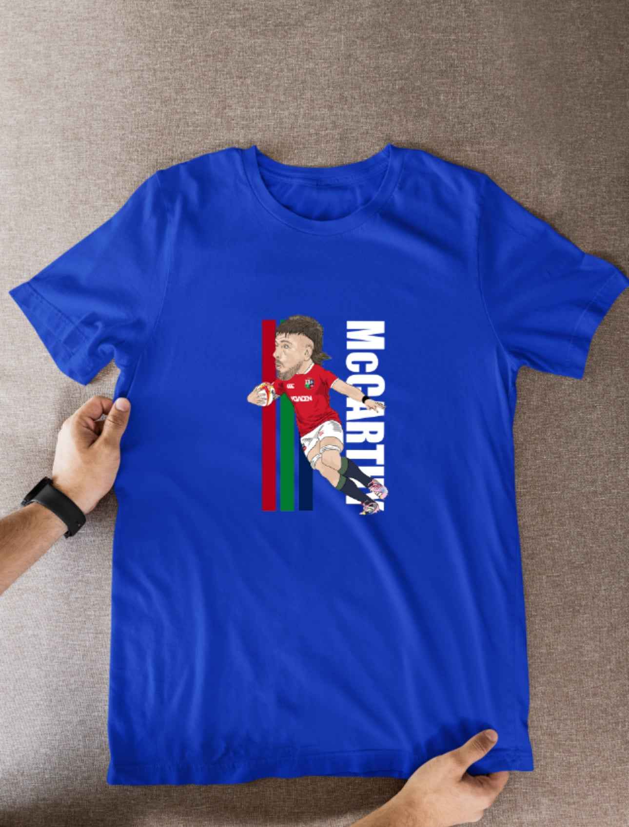 Joe McCarthy Rugby Lions Cartoon Graphic Soccer T-Shirt: Fan Wear