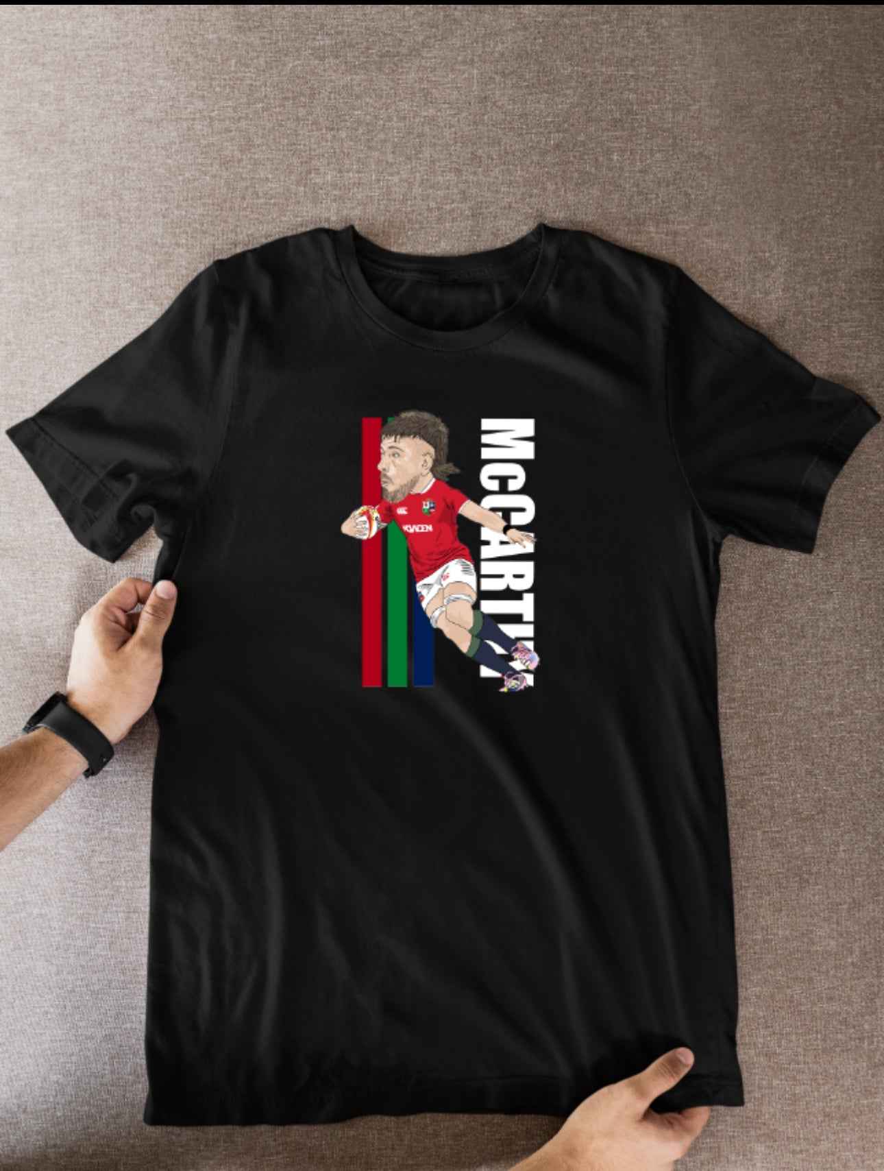 Joe McCarthy Rugby Lions Cartoon Graphic Soccer T-Shirt: Fan Wear